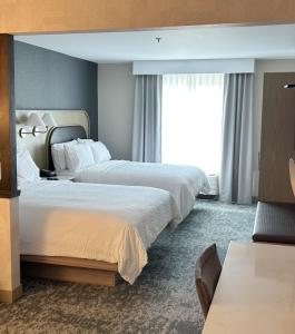 Photo of a newly remodeled Queen-Queen mini-suite with sleeper sofa