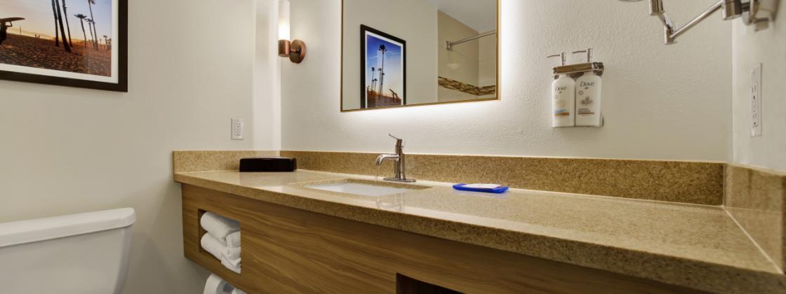 oversized counter in the bathroom, vanity mirror too